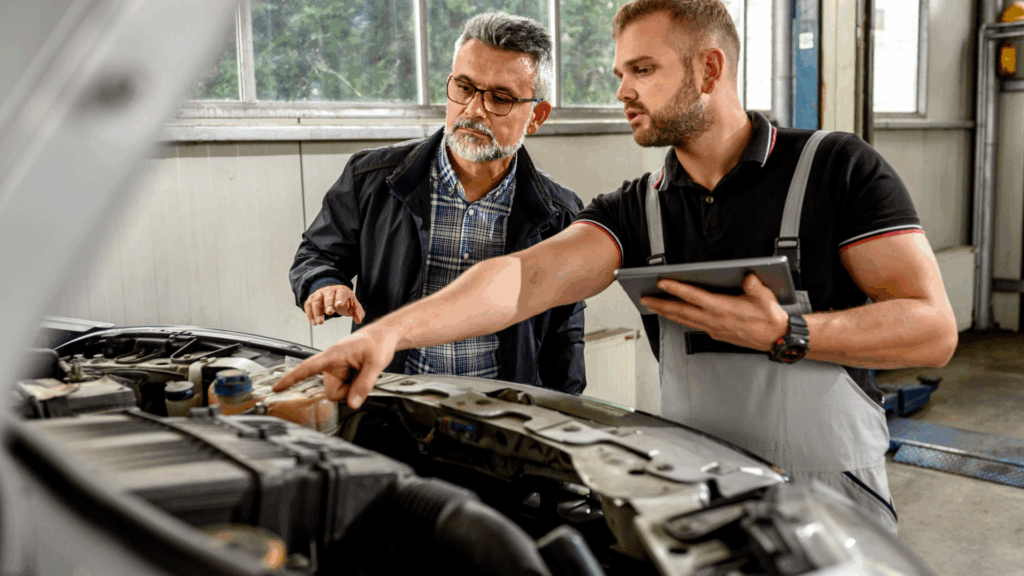 Technician performing car engine diagnostics at My Car Care