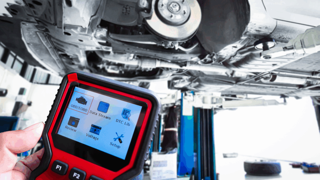 Technician performing car engine diagnostics at My Car Care