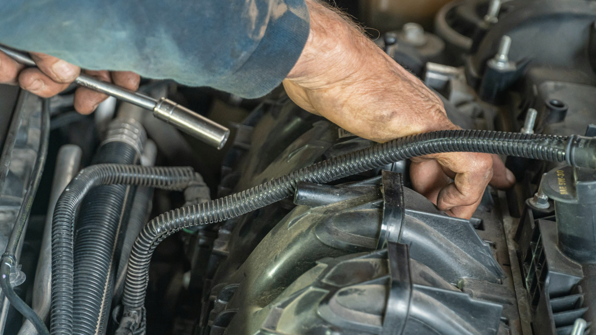 My Car Care Services technician performing engine services on a customer vehicle in Fredericksburg, VA