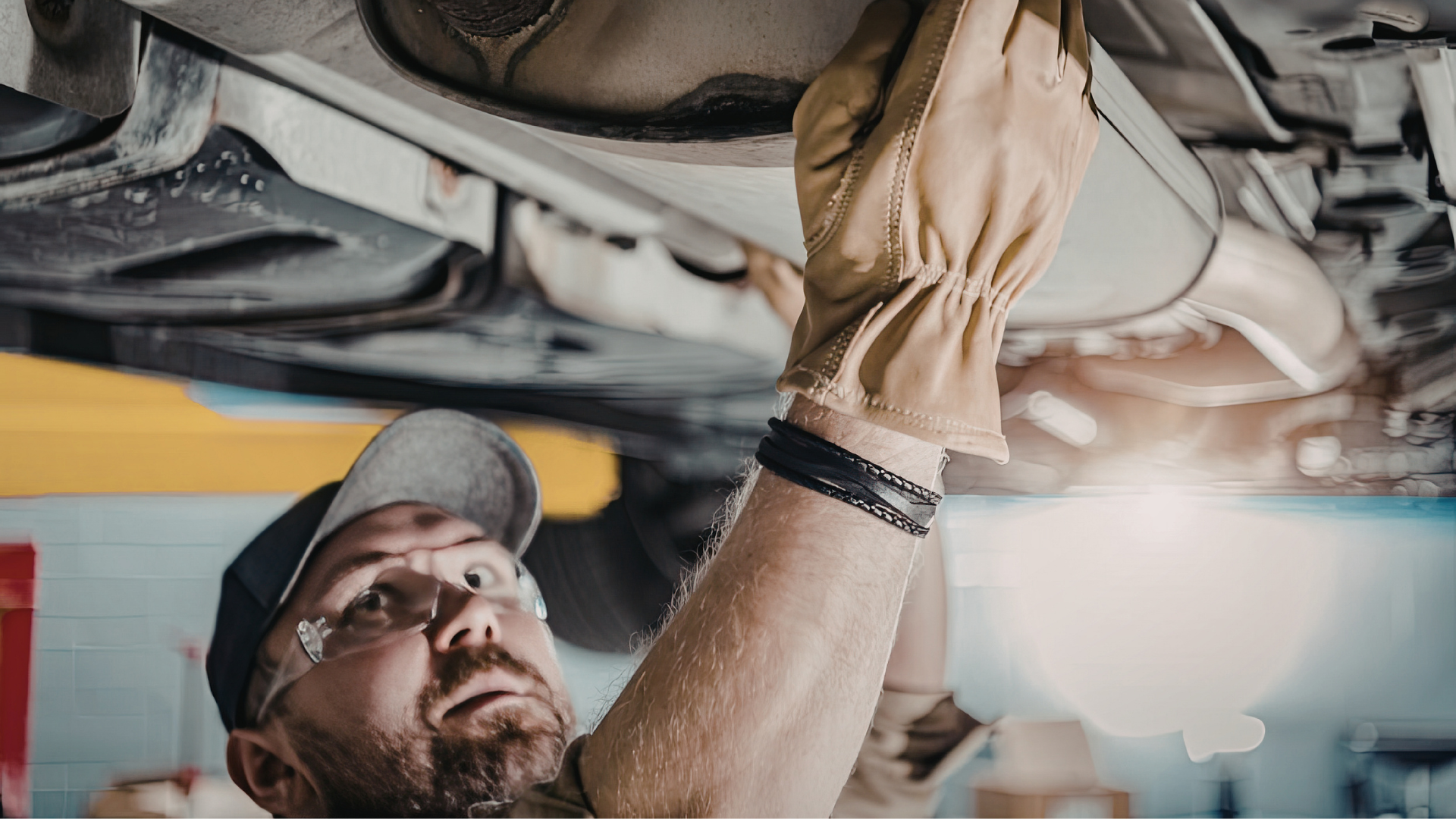 My Car Care Services technician performing exhaust system services on a customer vehicle in Fredericksburg, VA