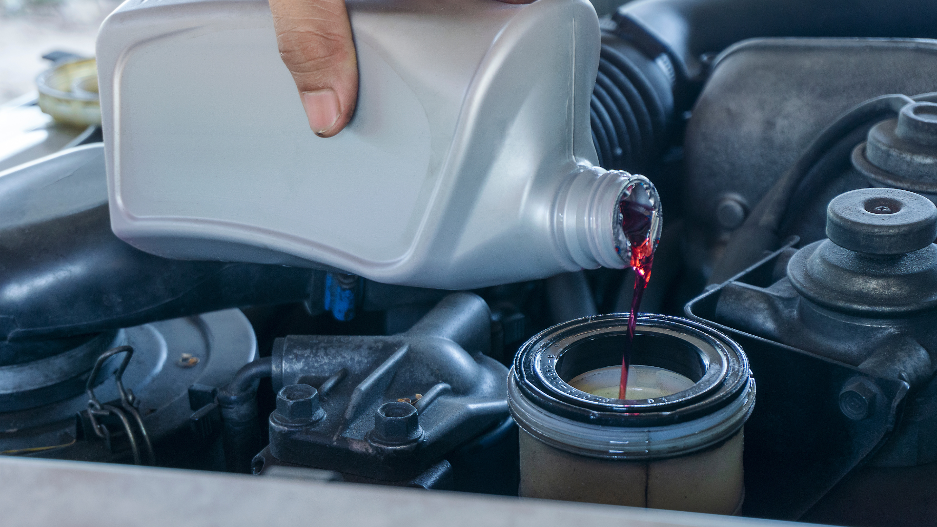 My Car Care Services technician performing power steering services on a customer vehicle in Fredericksburg, VA